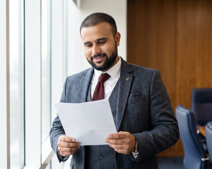 H&Y Law immigration lawyer reviewing a client's case